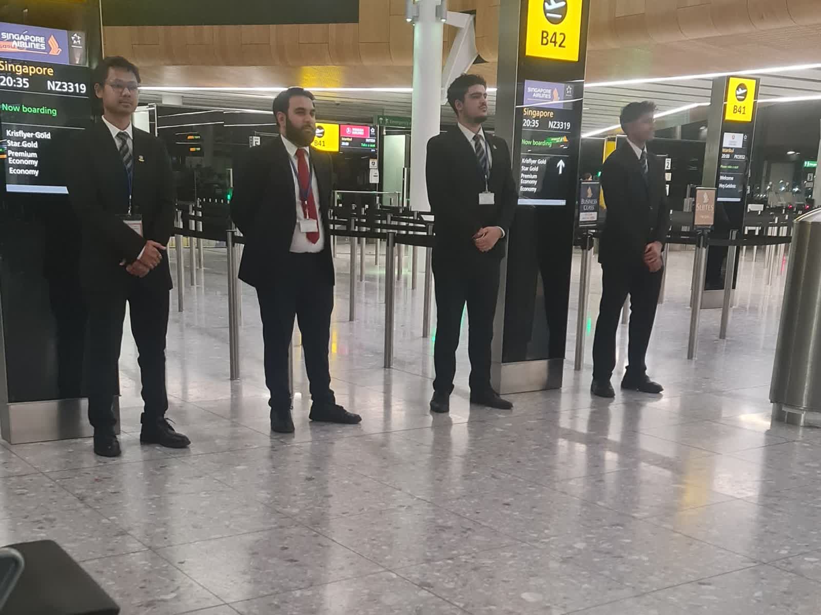 Pyrex officers on post at a Heathrow boarding gate